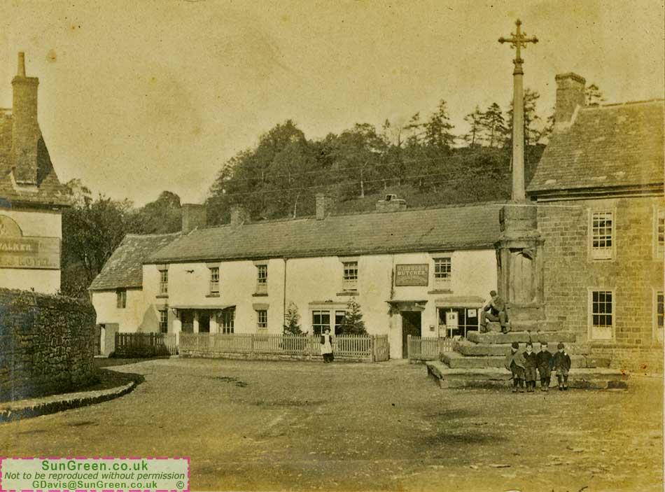 An old photo of Clearwell Cross in the centre of Clearwell village.