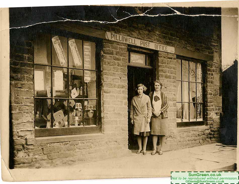 A photo of two women outside Pillowell Post Office.