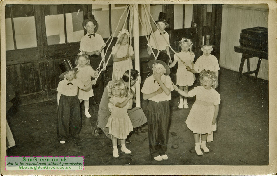 A Maypole inside the school