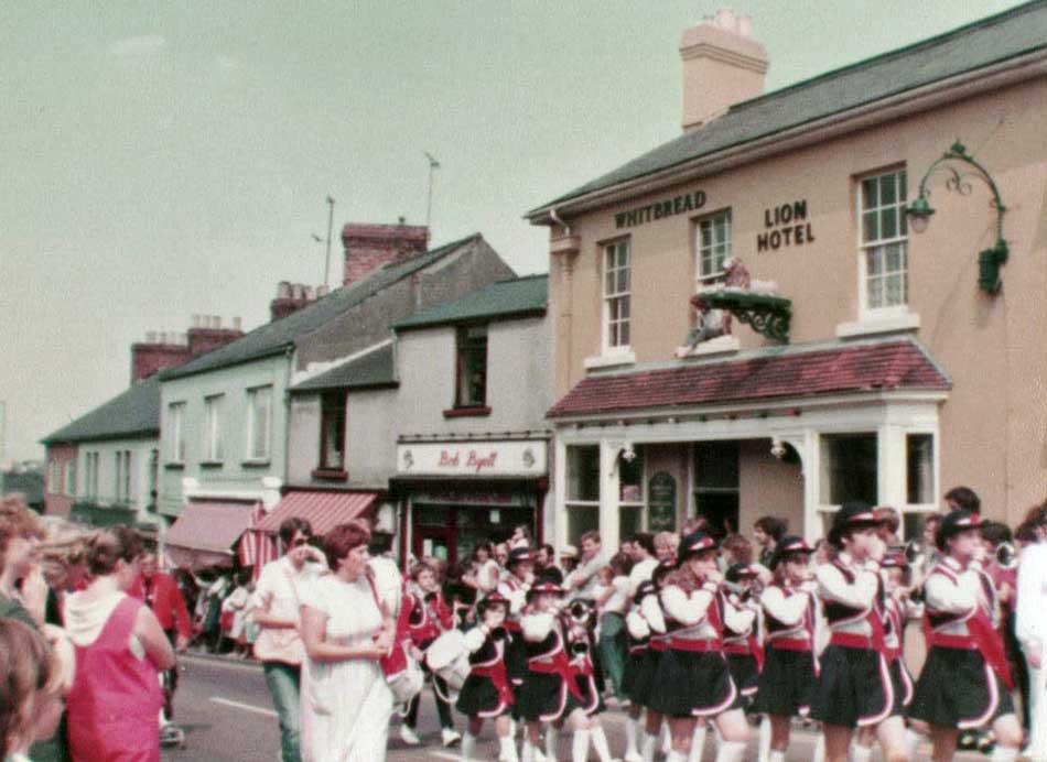 A photo of a Jazz Band marching through Cinderford, Gloucestershire