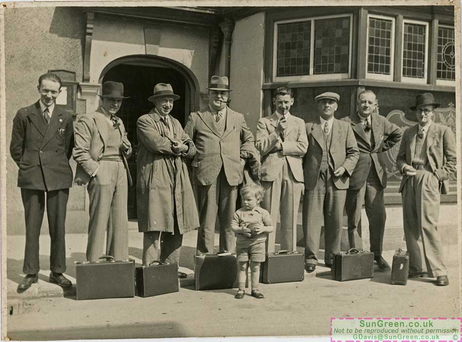 A photo of men outside the King's Head at Coleford
