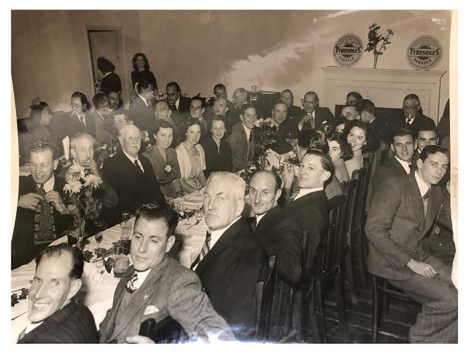 A photo of employees and at a dinner of Watts Tyres of Lydney